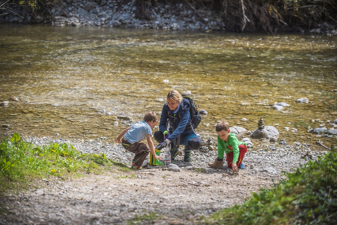Playing with children at the Lofer river