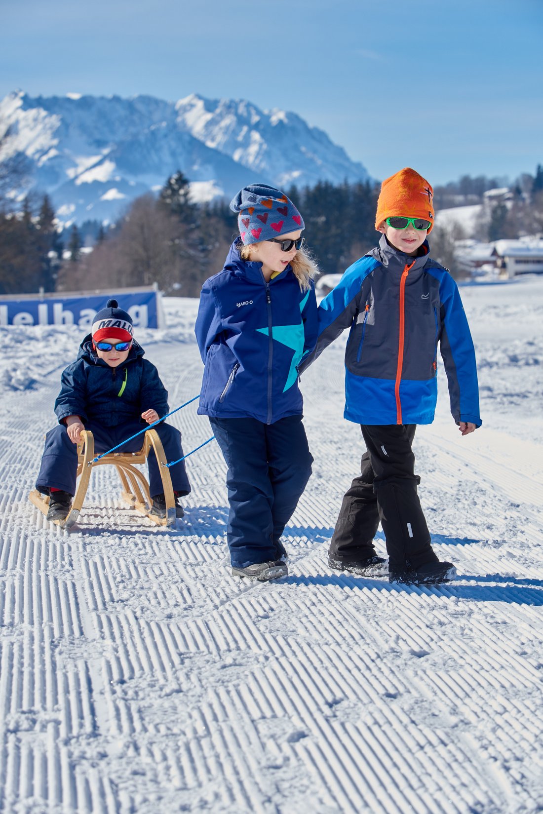 Winterurlaub mit Kindern im Schnee in Reit im Winkl
