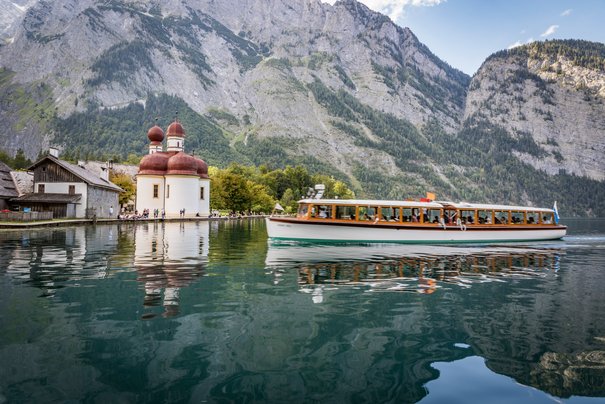 Electric boat on Lake Königssee in front of St. Bartholomä